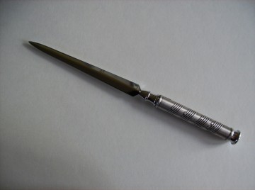 Briefopener, handvat met Muziek grafure