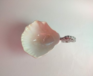 Kom oester met zeepaardje 11