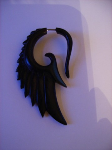 Oor sierraad, mahonie hout -Vleugel