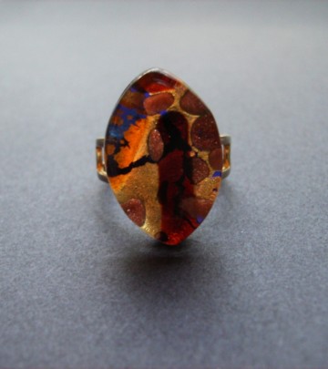 Ring, ovaal met metaal tinten